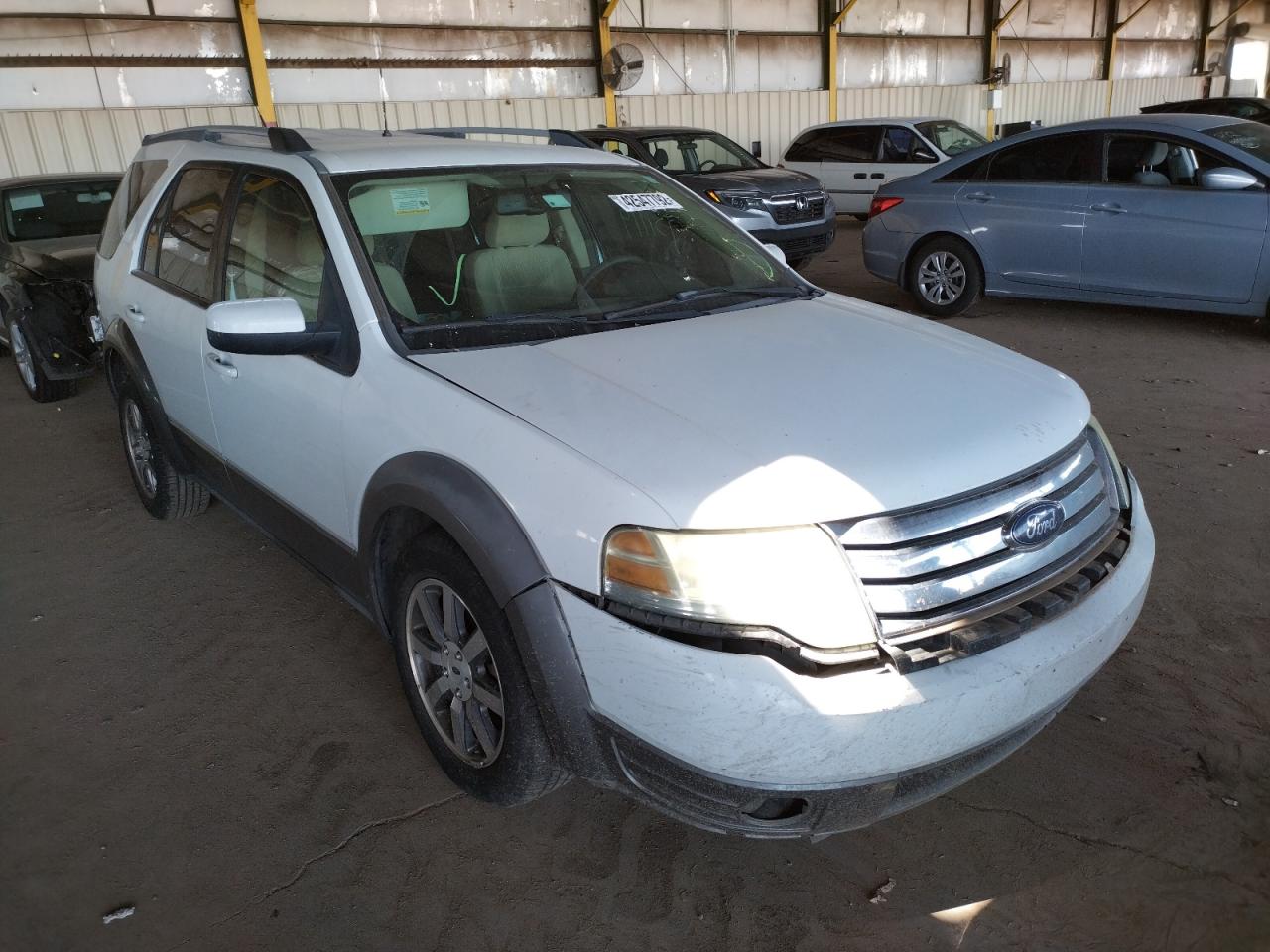 FORD TAURUS X S 2008 with VIN 1FMDK02W48GA10347 - Photo from auction