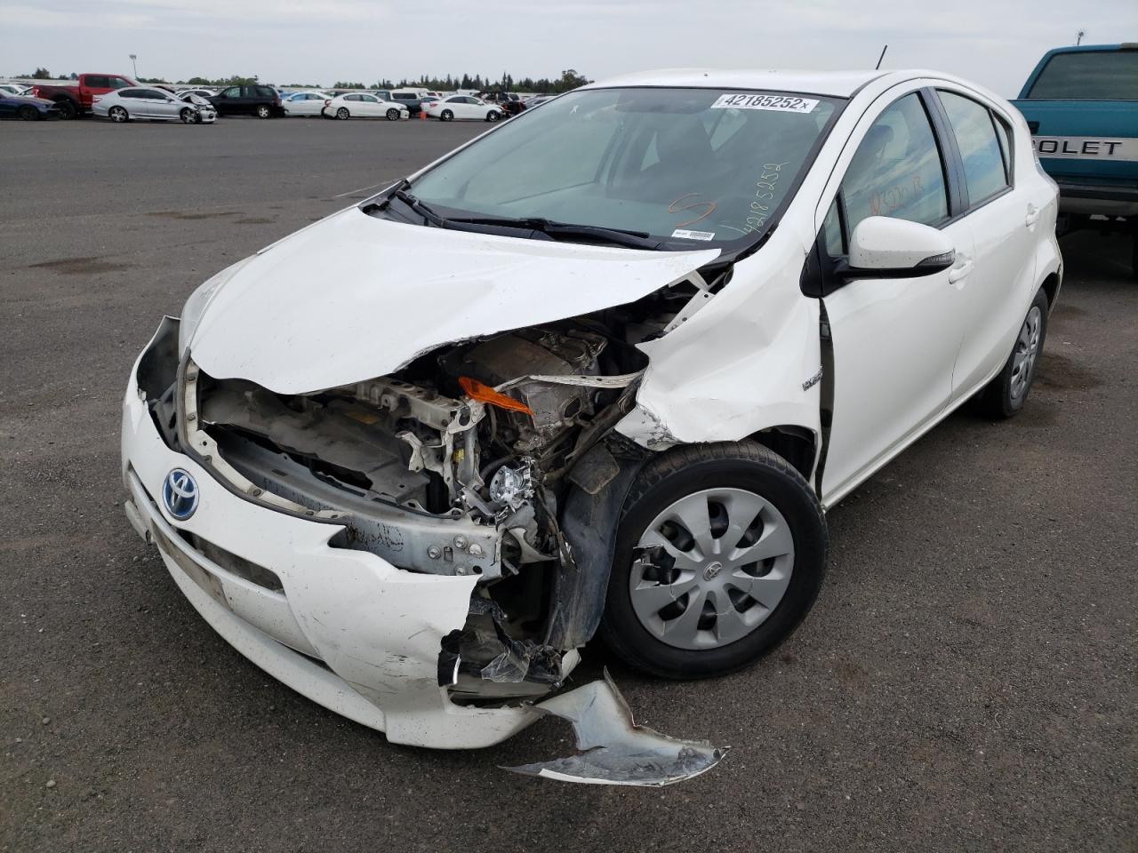 Photo 2 from auction – 2013 TOYOTA PRIUS C with VIN JTDKDTB35D1550266