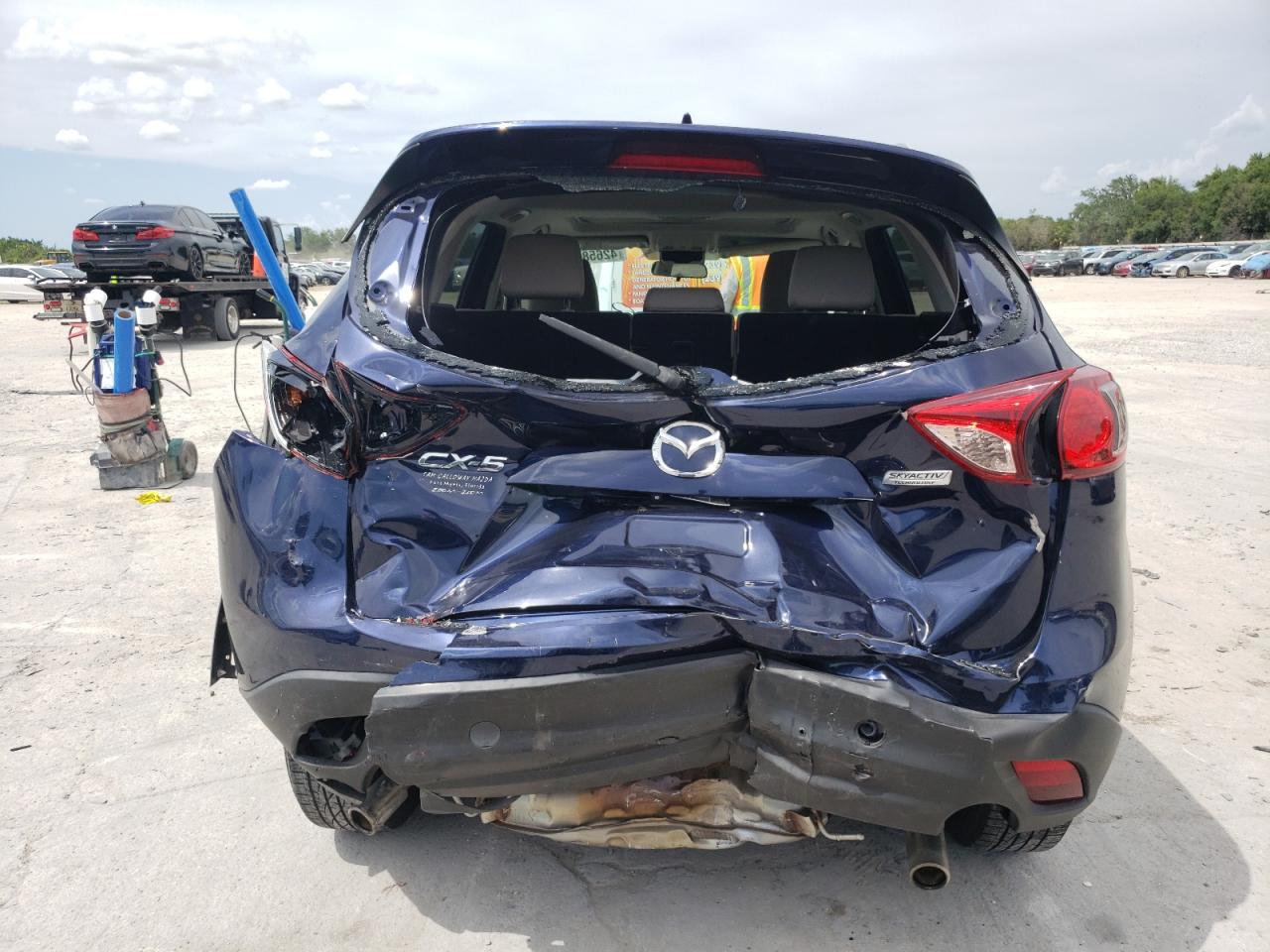 Photo 9 from auction – 2014 MAZDA CX-5 TOURI with VIN JM3KE2CYXE0331979