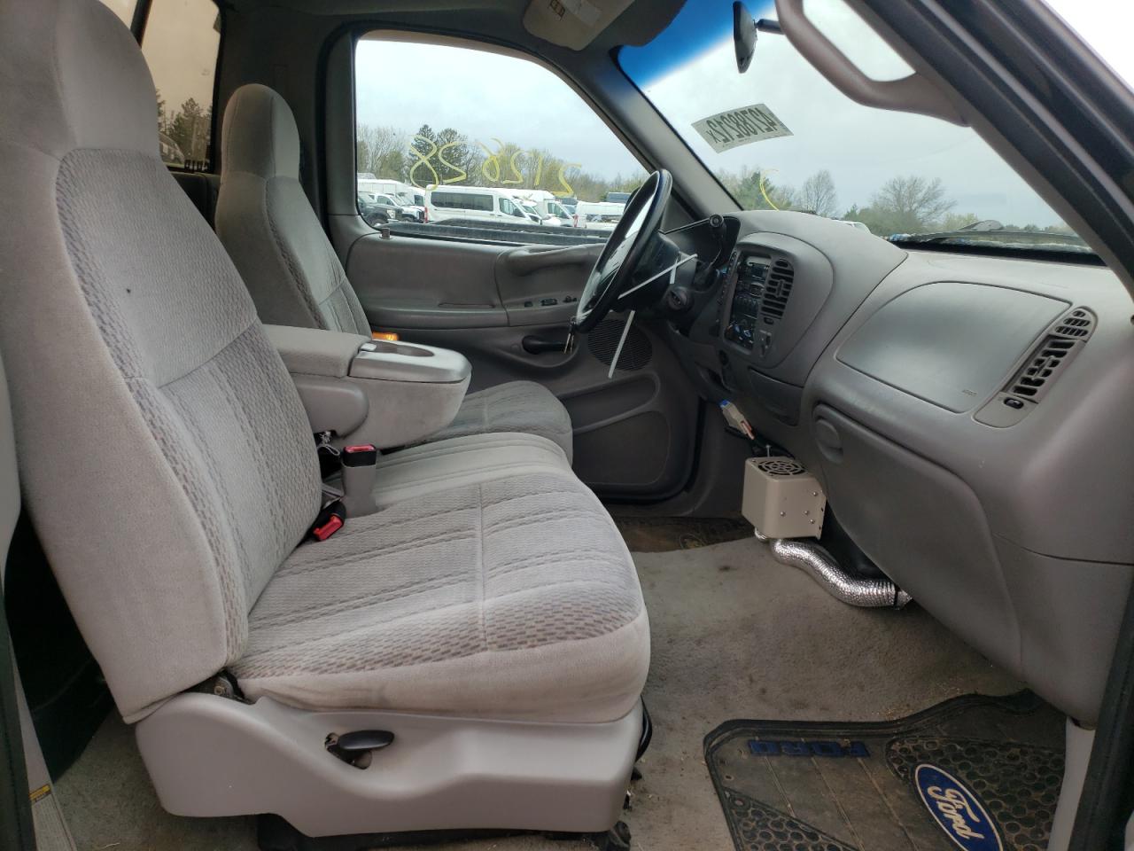 Photo 5 from auction – 1997 FORD F150 with VIN 2FTDF08W1VCA77467