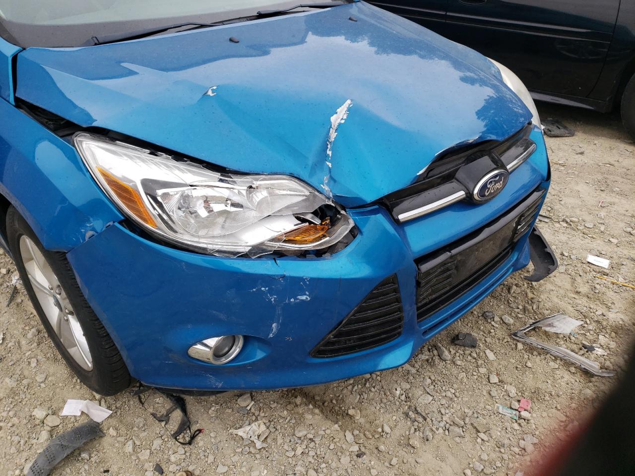 Photo 9 from auction – 2012 FORD FOCUS SE with VIN 1FAHP3F22CL414057