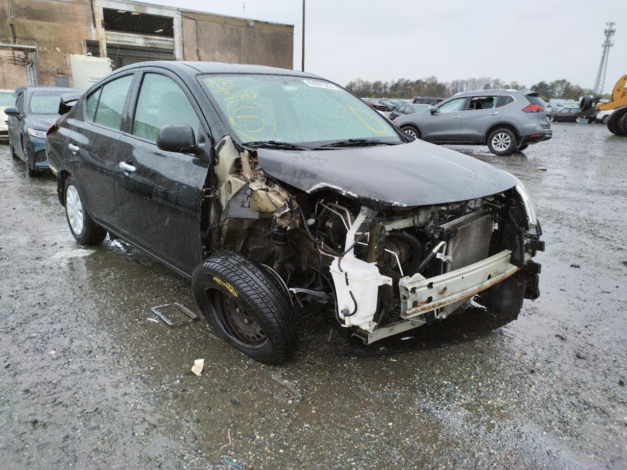 NISSAN VERSA S 2014 with VIN 3N1CN7AP8EL808077 - Photo from auction
