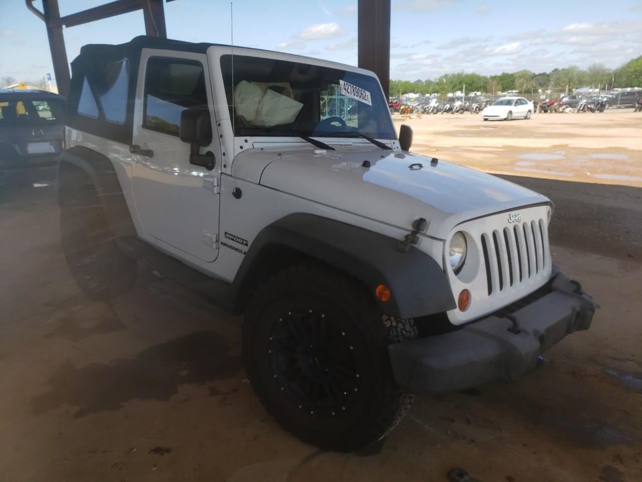 JEEP WRANGLER S 2012 with VIN 1C4AJWAG5CL263698 - Photo from auction