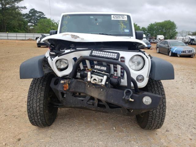 Photo 9 from auction – 2016 JEEP WRANGLER U with VIN 1C4BJWDG0GL148643