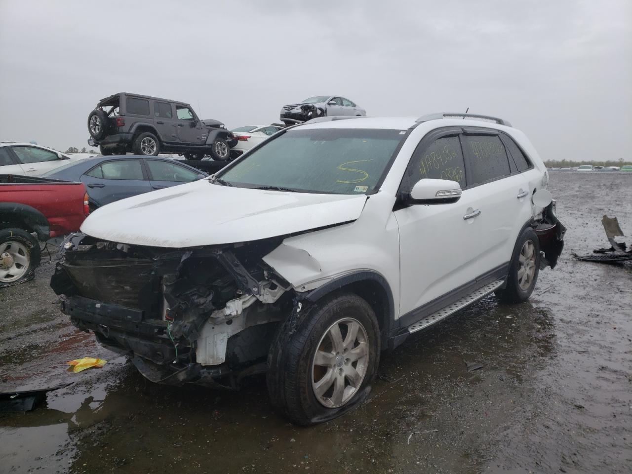 Photo 2 from auction – 2013 KIA SORENTO LX with VIN 5XYKT4A26DG403441