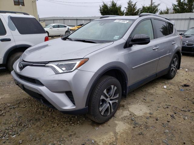 Photo 2 from auction – 2018 TOYOTA RAV4 LE with VIN JTMBFREV3JJ243698