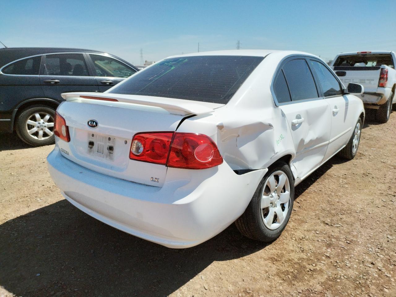 Photo 4 from auction – 2007 KIA OPTIMA LX with VIN KNAGE123775146094