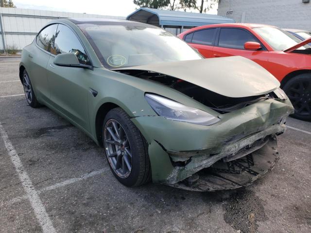 TESLA MODEL 3 2021 with VIN 5YJ3E1EB4MF001173 - Photo from auction