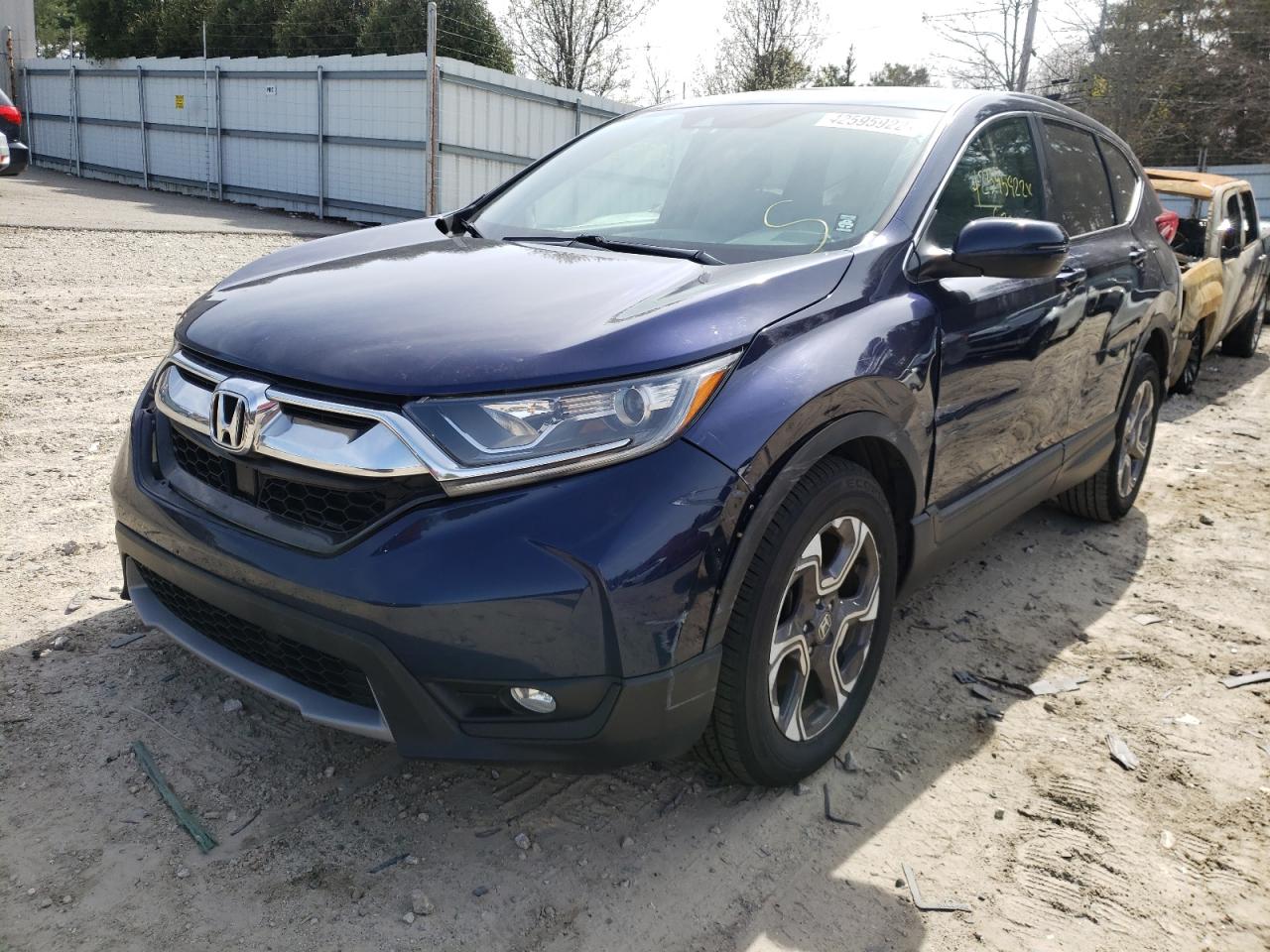 Photo 2 from auction – 2018 HONDA CR-V EXL with VIN 7FARW2H88JE015543