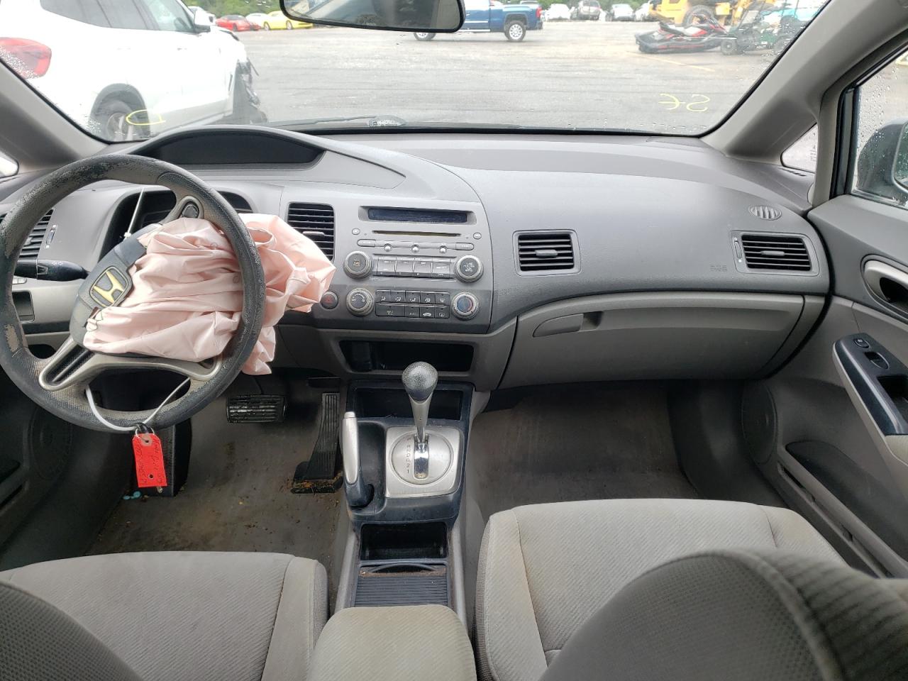 Photo 9 from auction – 2011 HONDA CIVIC LX with VIN 19XFA1F57BE045589