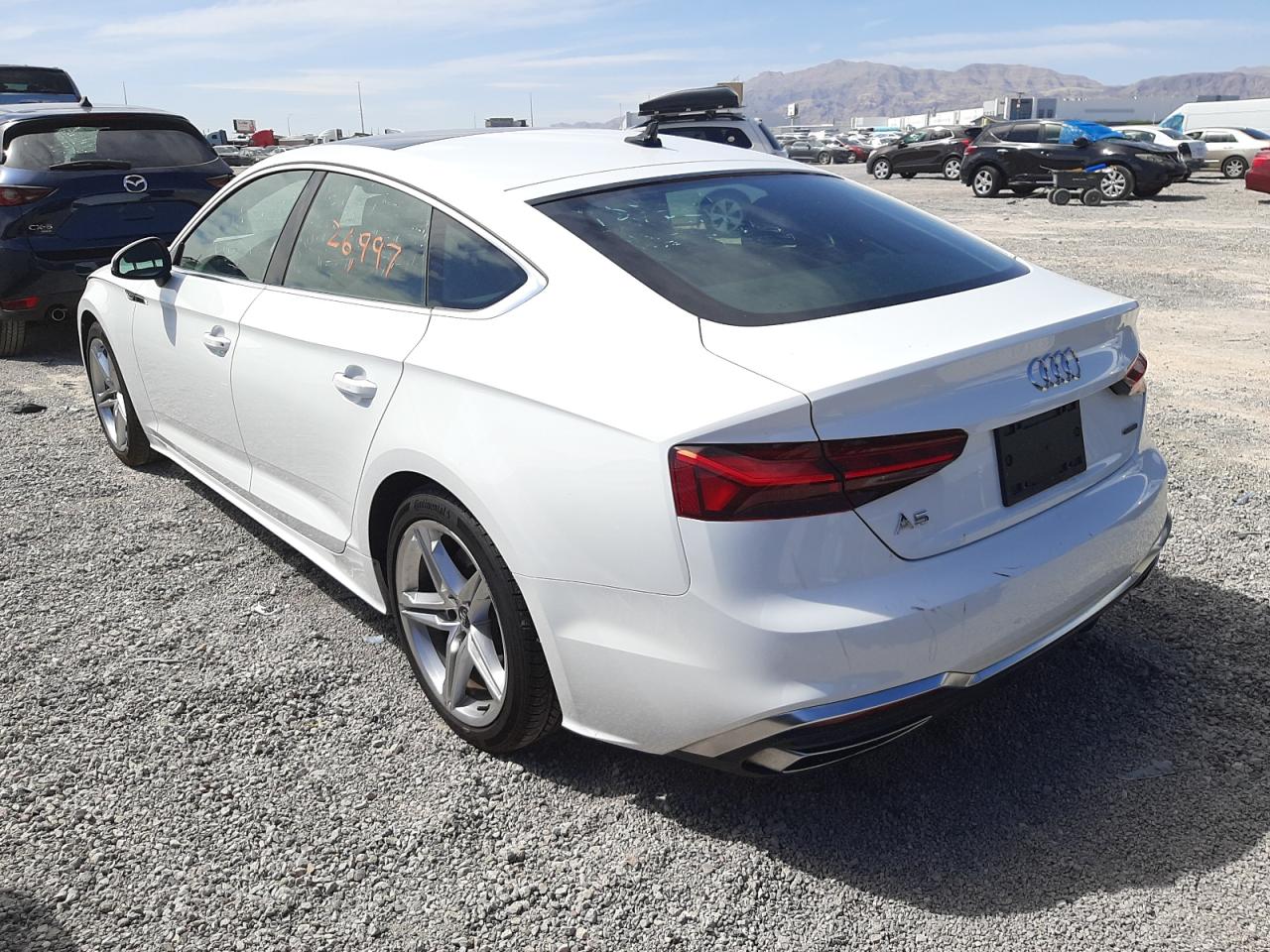 Photo 3 from auction – 2021 AUDI A5 PREMIUM with VIN WAUDACF55MA054054