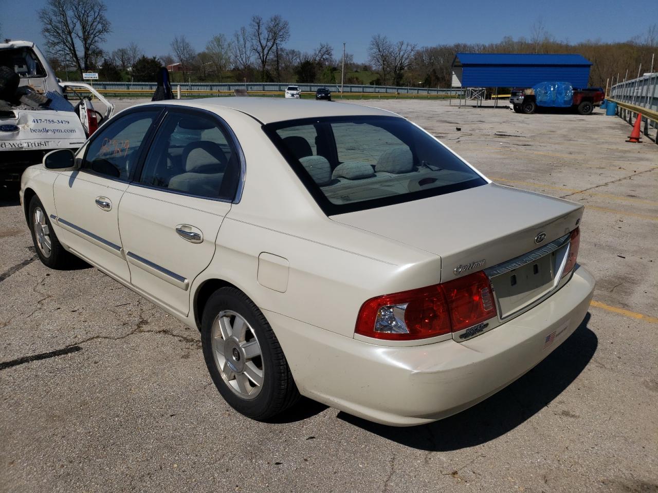 Photo 3 from auction – 2005 KIA OPTIMA LX with VIN KNAGD126555422802