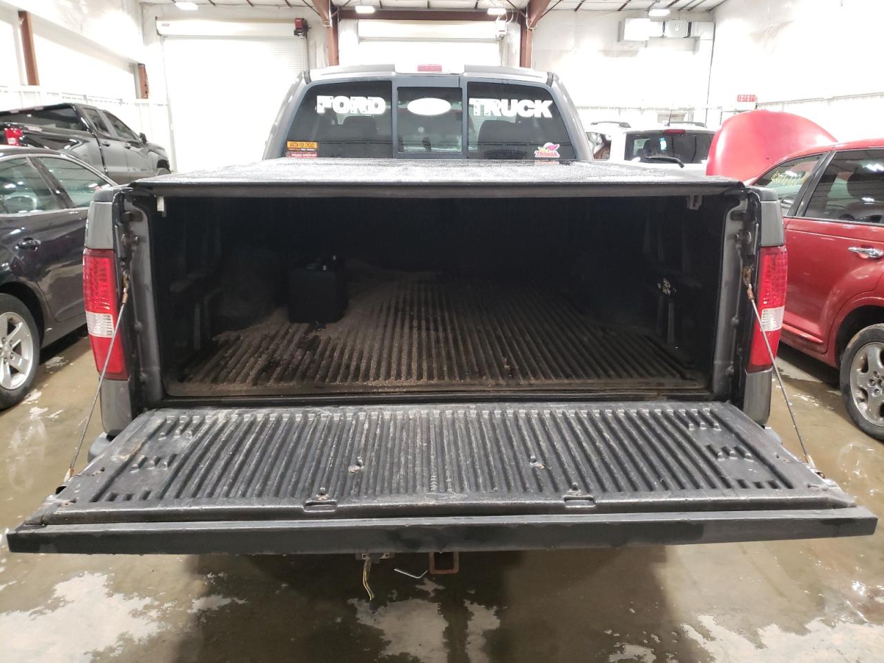 Photo 9 from auction – 2004 FORD F150 with VIN 1FTPX14544NC27481