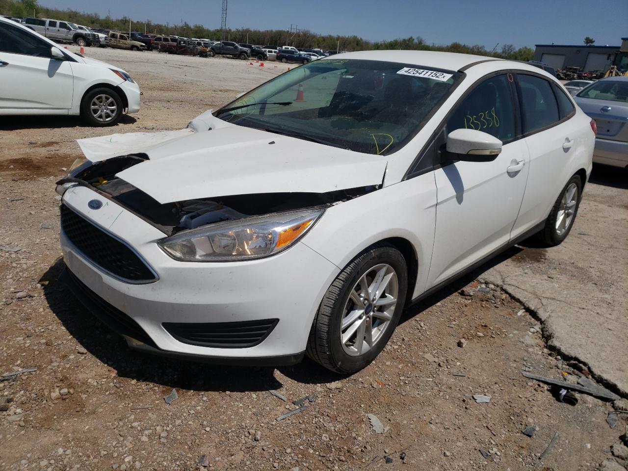 Photo 2 from auction – 2016 FORD FOCUS SE with VIN 1FADP3F29GL204513