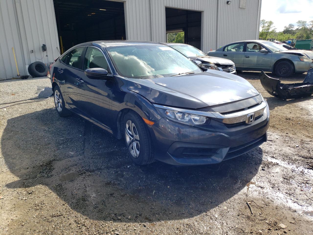 HONDA CIVIC LX 2017 with VIN 19XFC2F56HE014682 - Photo from auction