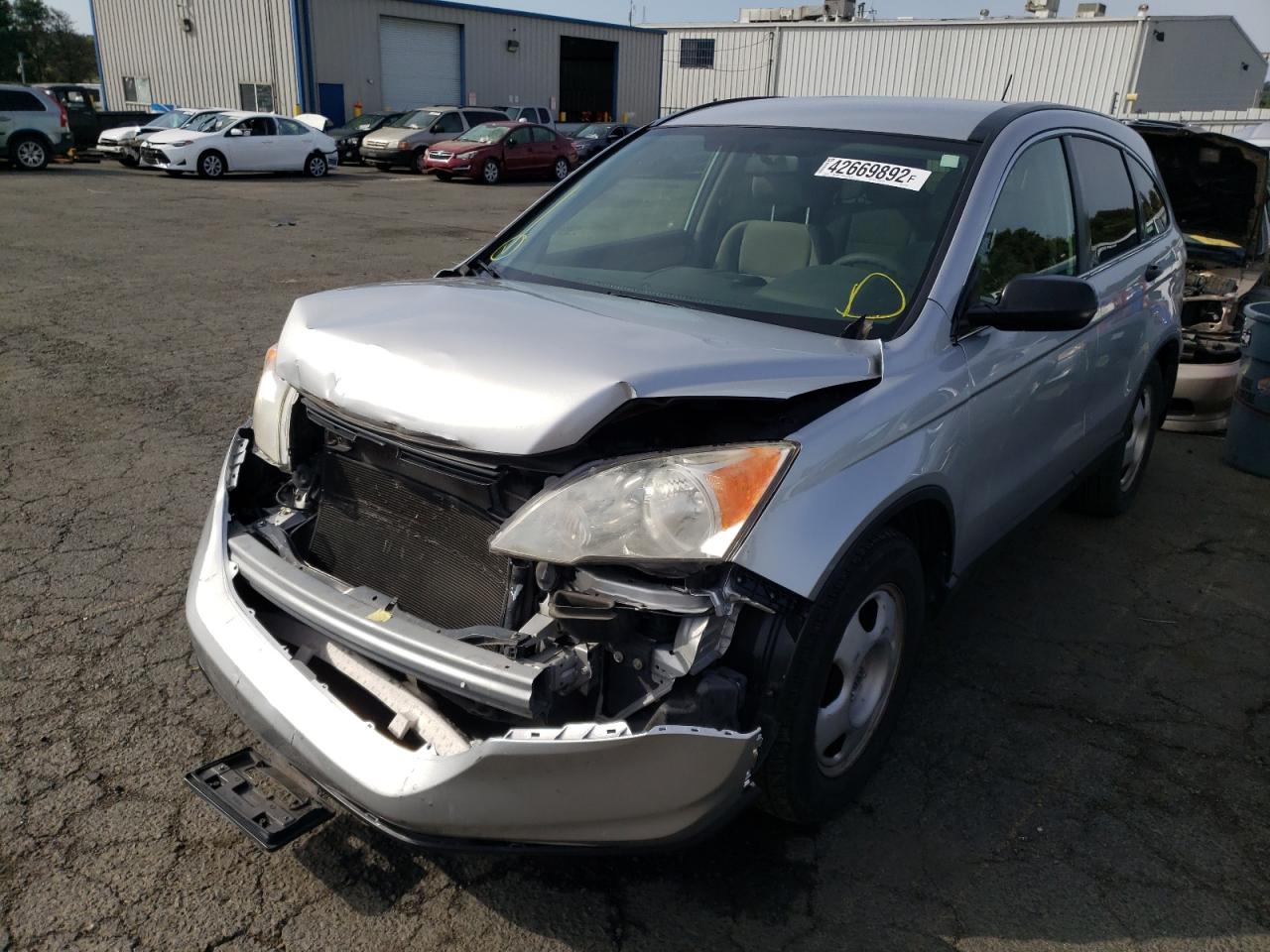 Photo 2 from auction – 2011 HONDA CR-V LX with VIN JHLRE3H30BC014641