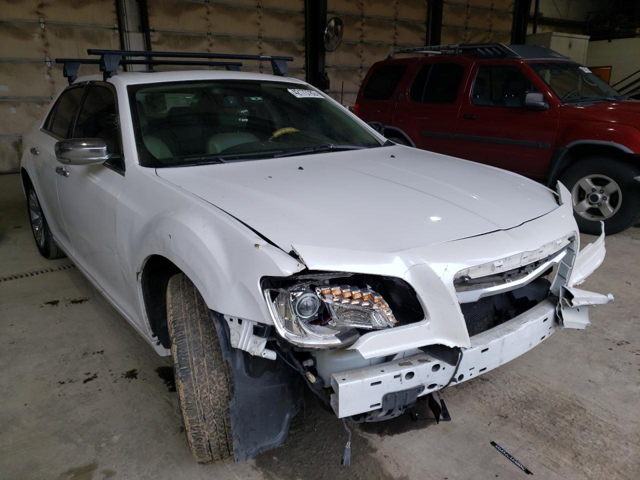 CHRYSLER 300C 2014 with VIN 2C3CCAEG6EH181208 - Photo from auction
