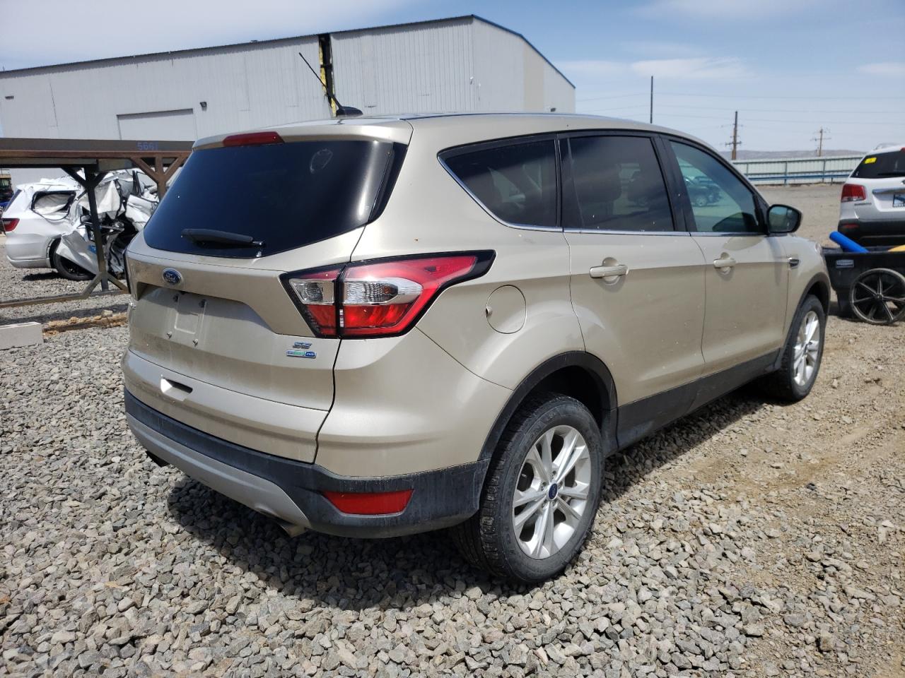 Photo 4 from auction – 2017 FORD ESCAPE SE with VIN 1FMCU9GD2HUF05469