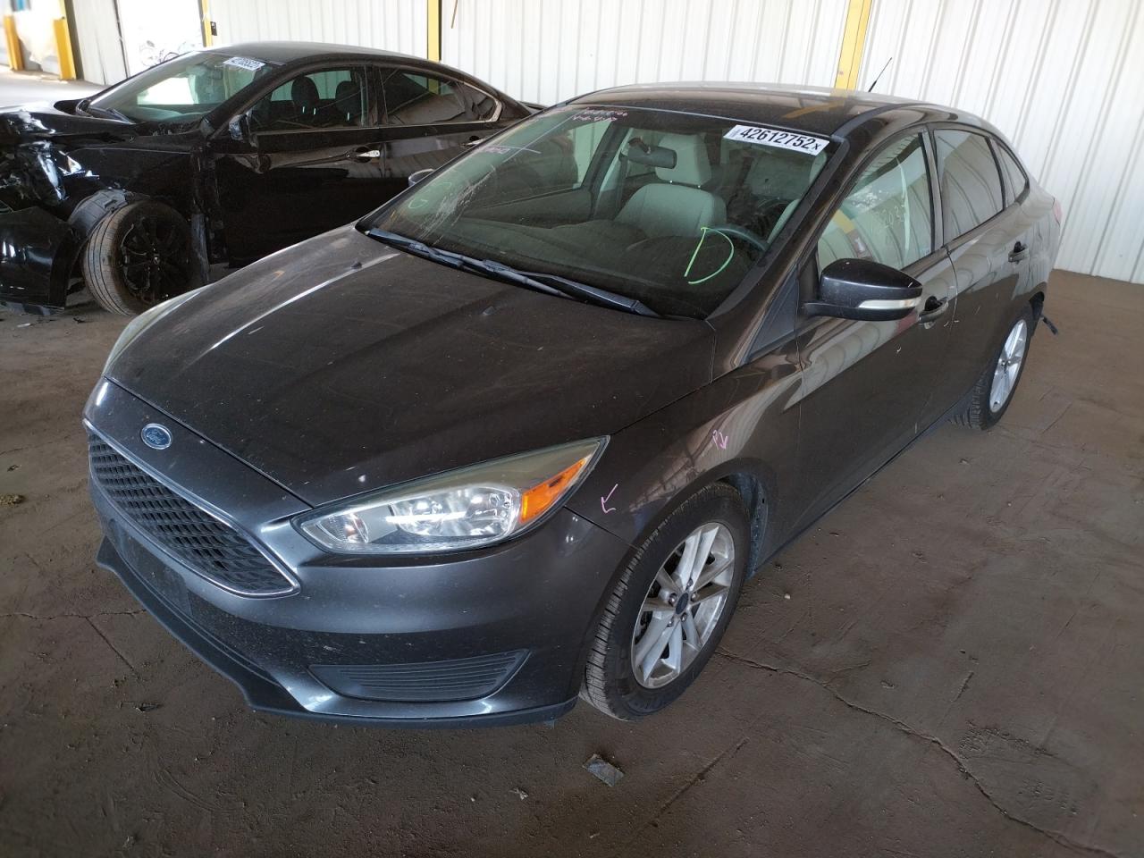 Photo 2 from auction – 2015 FORD FOCUS SE with VIN 1FADP3F22FL256760