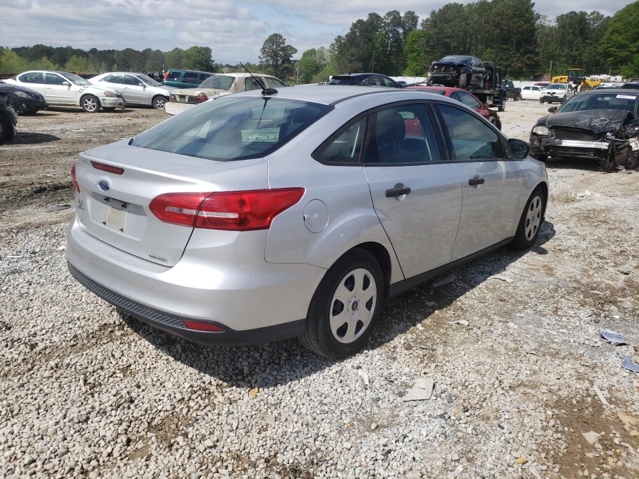 Photo 4 from auction – 2015 FORD FOCUS S with VIN 1FADP3E24FL311078