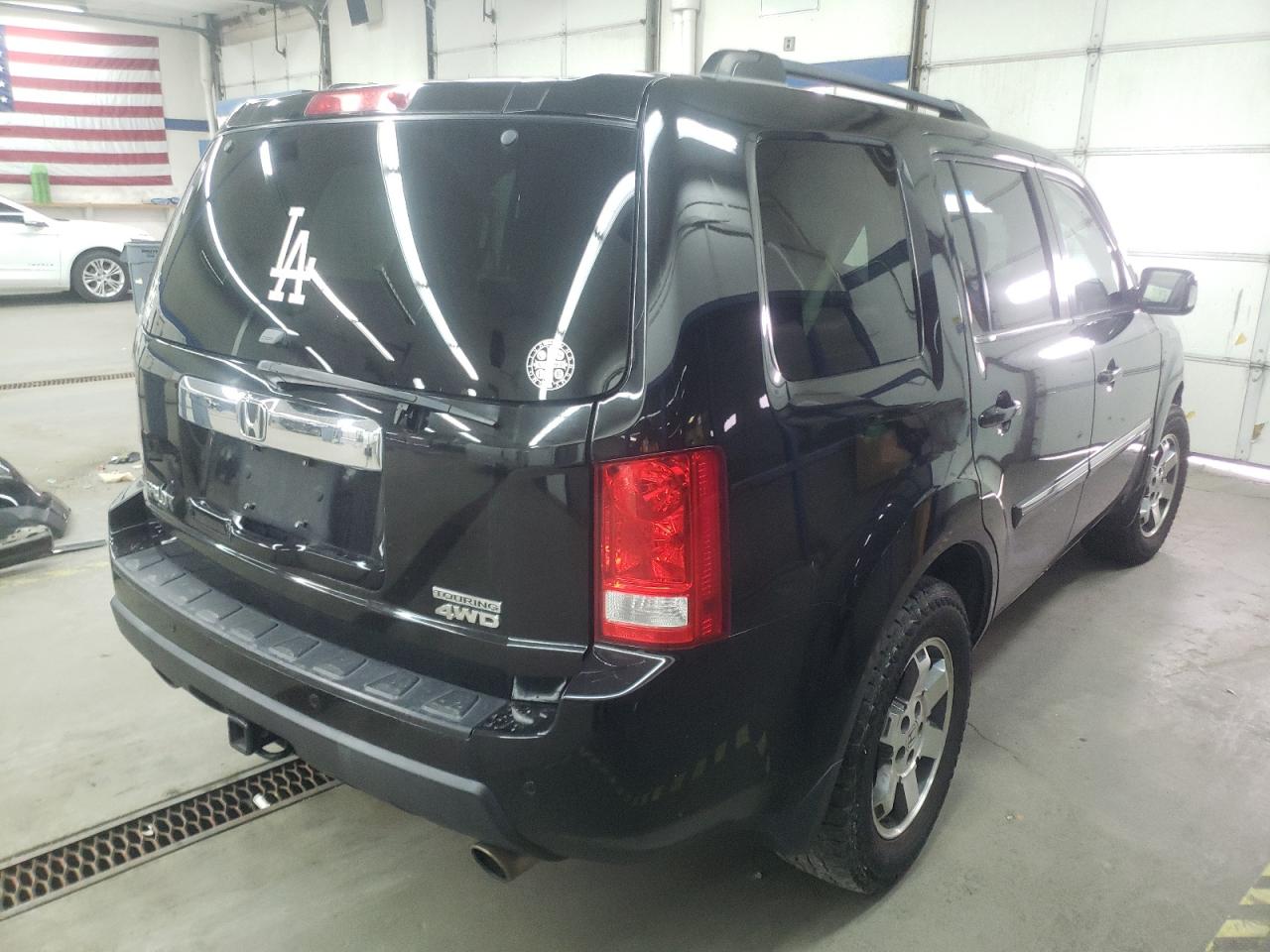 Photo 4 from auction – 2010 HONDA PILOT TOUR with VIN 5FNYF4H88AB039909