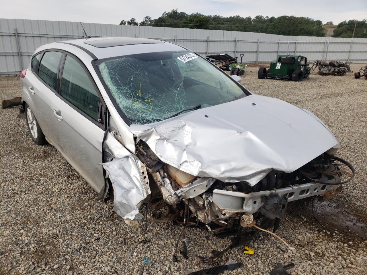 FORD FOCUS SE 2016 with VIN 1FADP3K20GL352278 - Photo from auction
