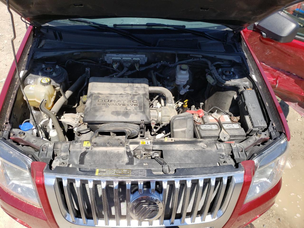 Photo 7 from auction – 2009 MERCURY MARINER with VIN 4M2CU91G99KJ05780