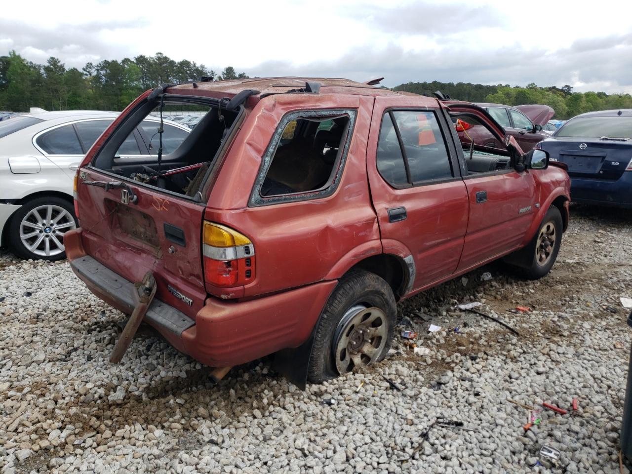 Photo 4 from auction – 1999 HONDA PASSPORT E with VIN 4S6CK58W8X4414775