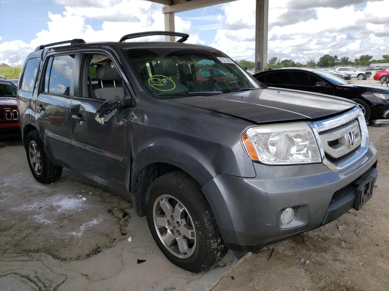 Photo 1 from auction – 2009 HONDA PILOT TOUR with VIN 5FNYF38819B020074