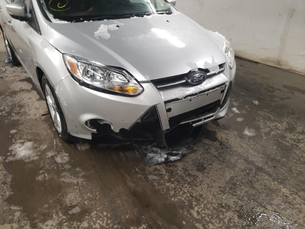 Photo 9 from auction – 2014 FORD FOCUS SE with VIN 1FADP3F21EL459959