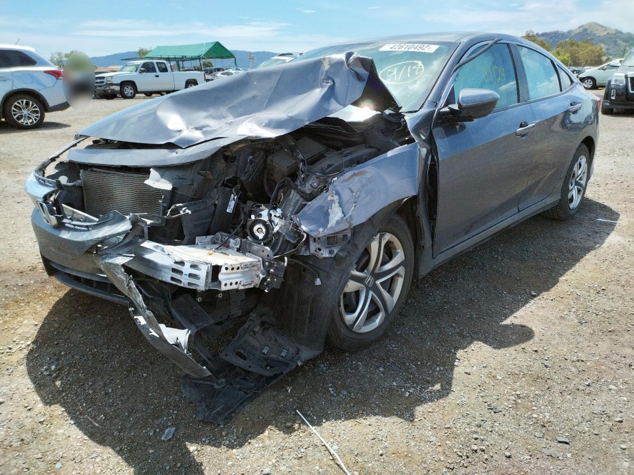 Photo 2 from auction – 2016 HONDA CIVIC LX with VIN 19XFC2F53GE228253
