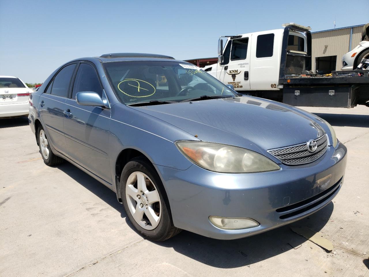 TOYOTA CAMRY LE 2002 with VIN JTDBF32K520026085 - Photo from auction