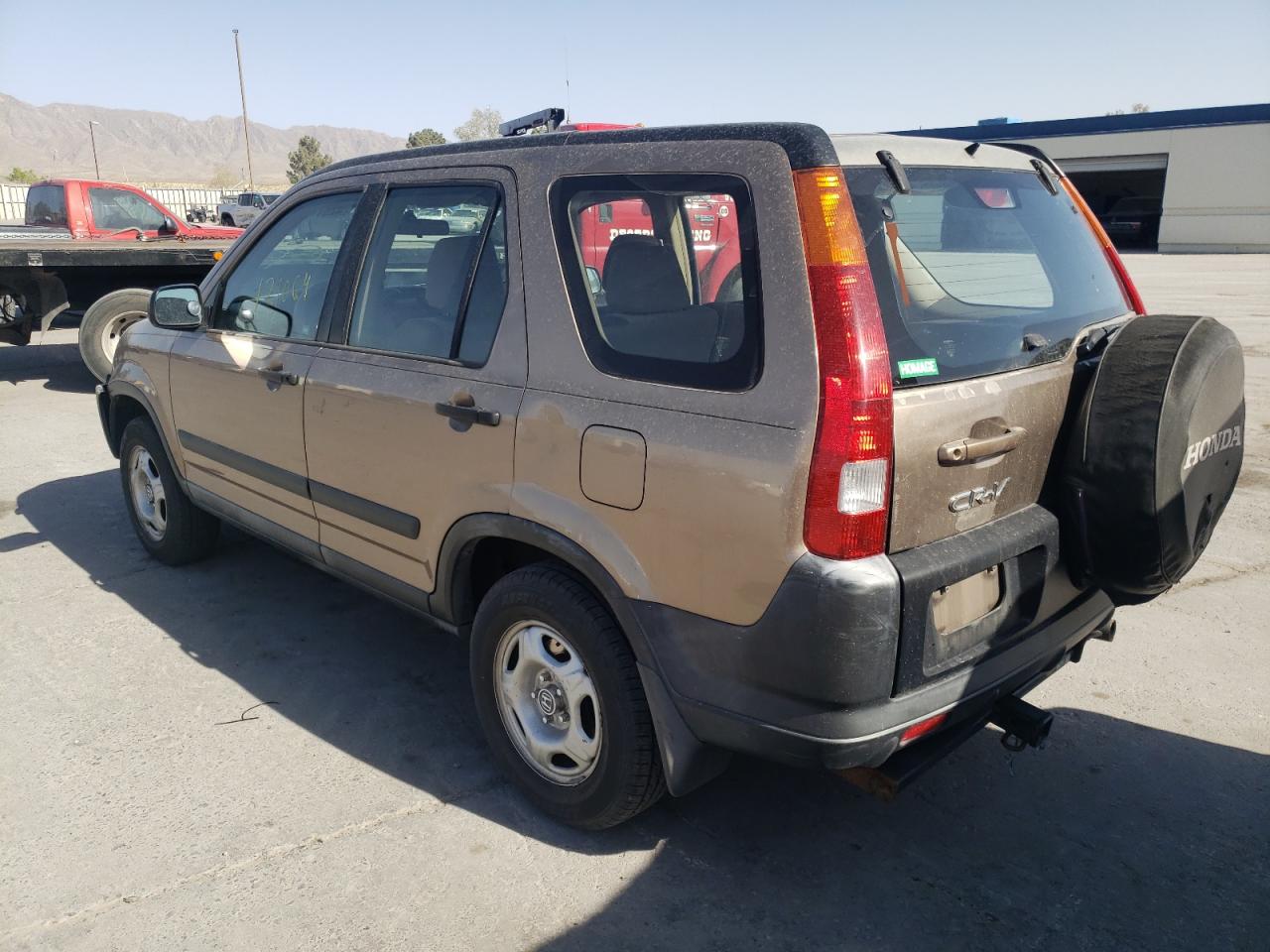 Photo 3 from auction – 2002 HONDA CR-V LX with VIN JHLRD68462C004113
