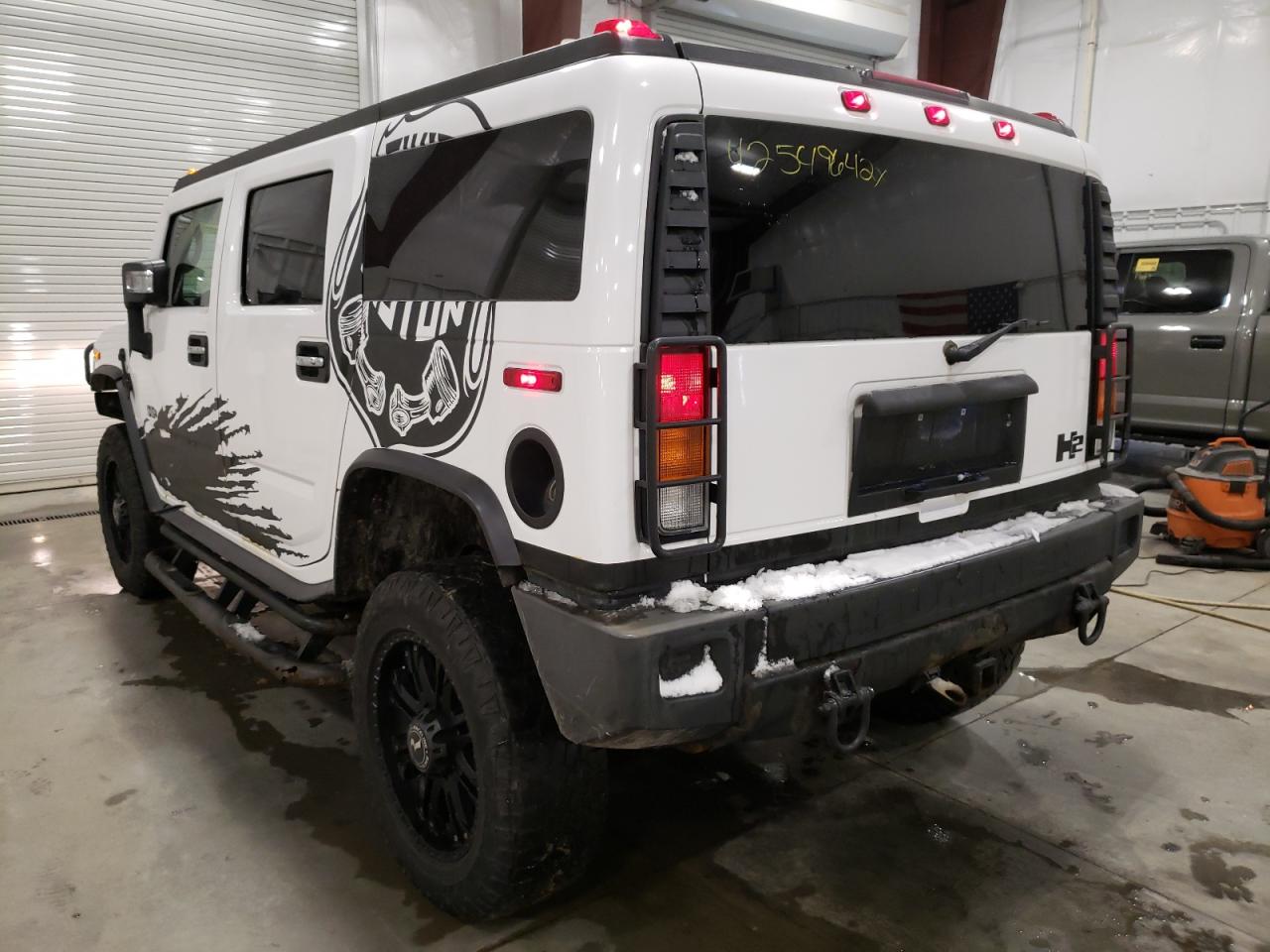 Photo 3 from auction – 2003 HUMMER H2 with VIN 5GRGN23U13H147734