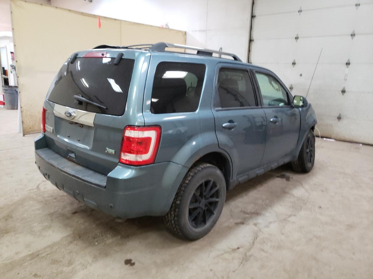 Photo 4 from auction – 2010 FORD ESCAPE LIM with VIN 1FMCU9EG3AKA94761