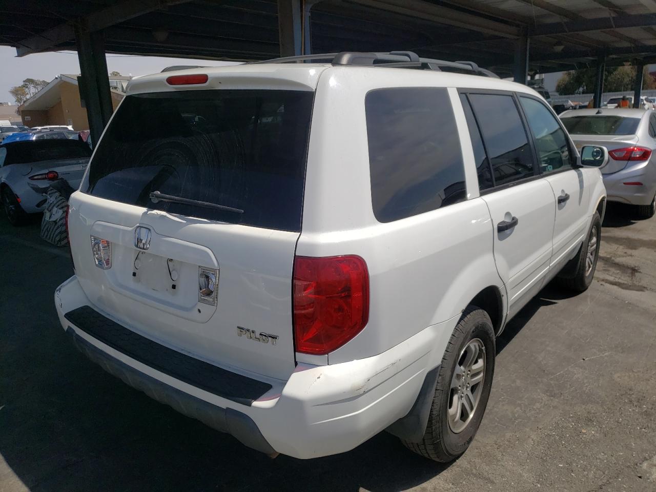 Photo 4 from auction – 2003 HONDA PILOT EX with VIN 2HKYF18473H543657