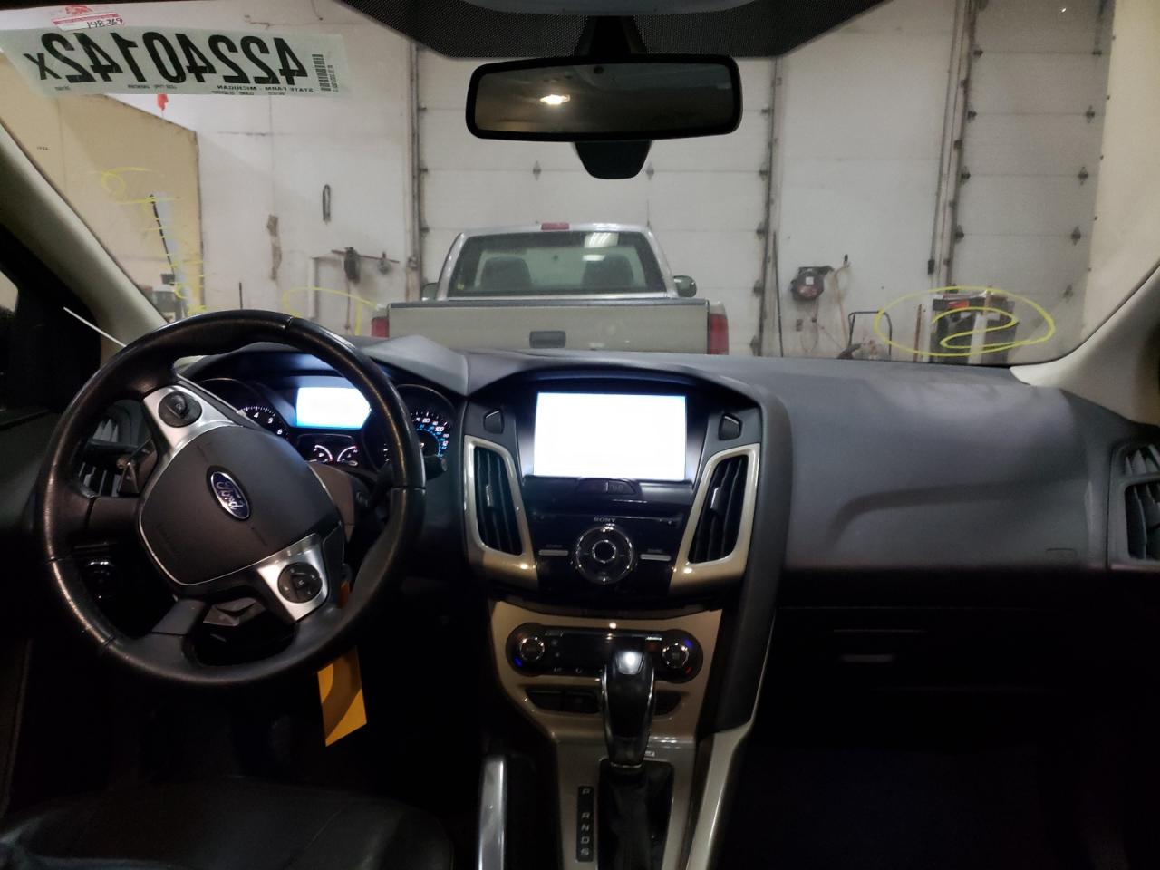 Photo 9 from auction – 2012 FORD FOCUS SEL with VIN 1FAHP3M23CL261966