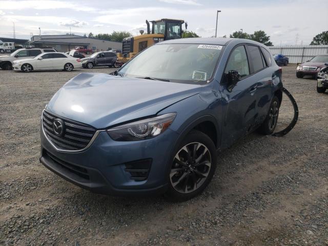 Photo 2 from auction – 2016 MAZDA CX-5 GT with VIN JM3KE4DY0G0610578