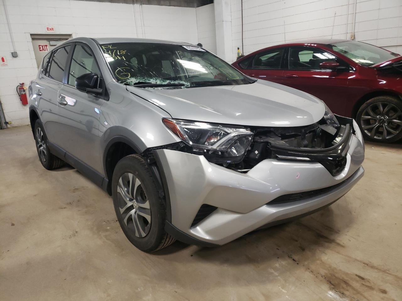 TOYOTA RAV4 LE 2018 with VIN 2T3BFREV4JW727669 - Photo from auction