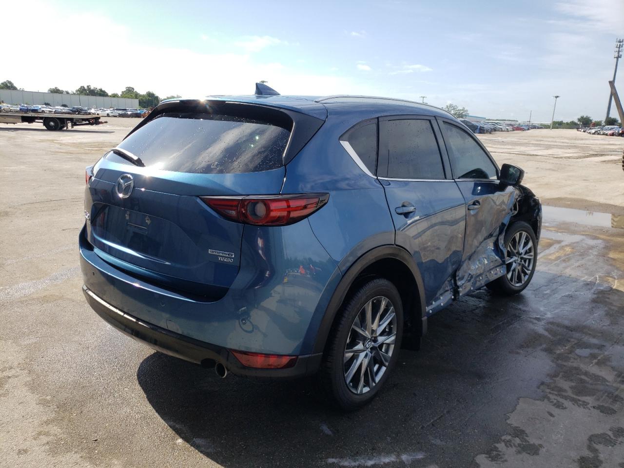 Photo 4 from auction – 2021 MAZDA CX-5 SIGNA with VIN JM3KFBEY0M0377569