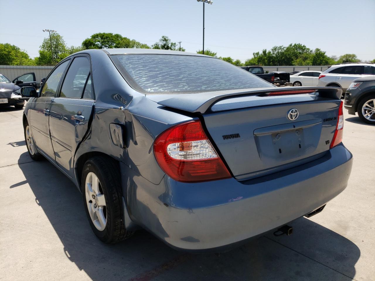 Photo 9 from auction – 2002 TOYOTA CAMRY LE with VIN JTDBF32K520026085