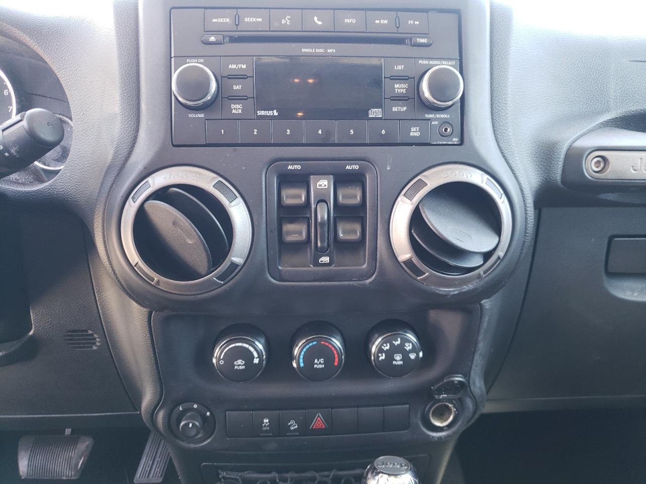 Photo 9 from auction – 2016 JEEP WRANGLER U with VIN 1C4BJWDG7GL251803