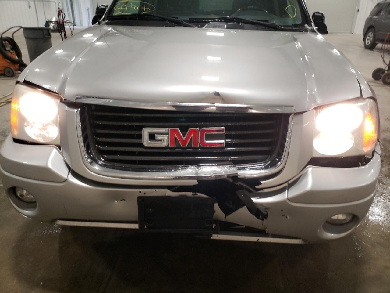 Photo 9 from auction – 2006 GMC ENVOY with VIN 1GKDT13S262340036