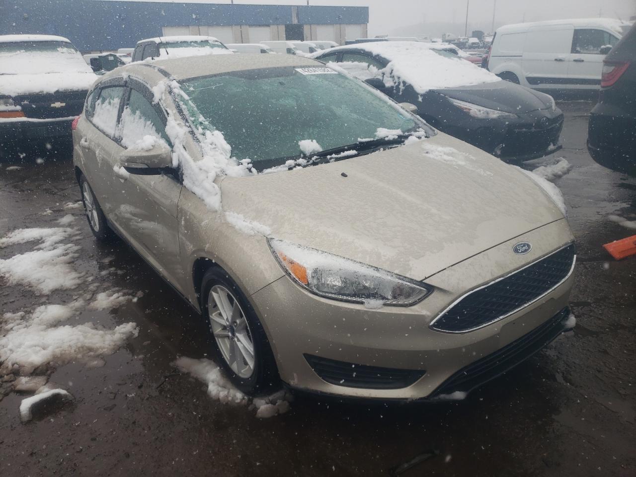 FORD FOCUS SE 2017 with VIN 1FADP3K23HL290957 - Photo from auction