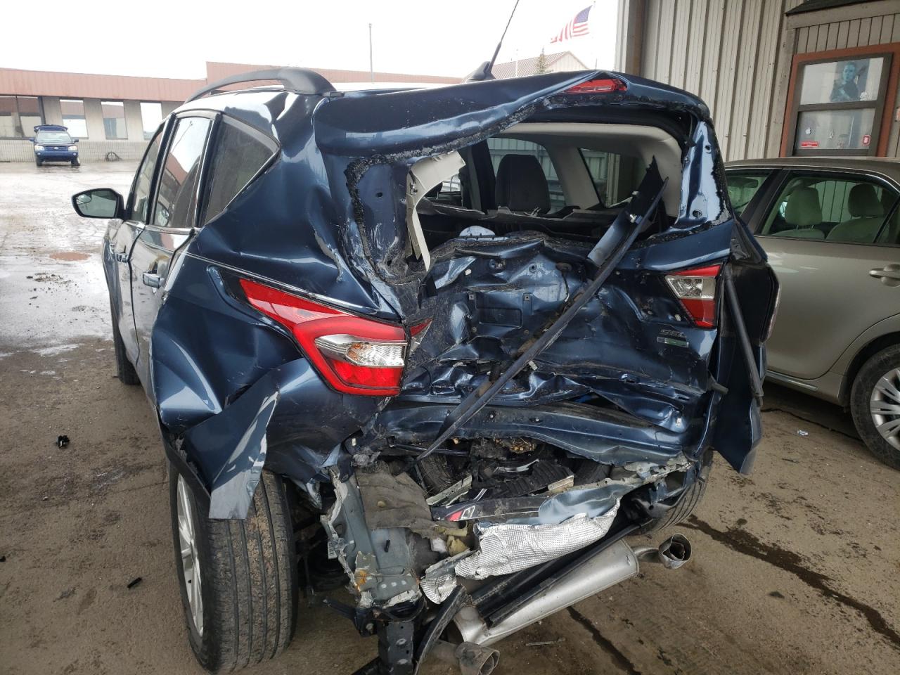 Photo 9 from auction – 2018 FORD ESCAPE SEL with VIN 1FMCU0HD4JUC32809