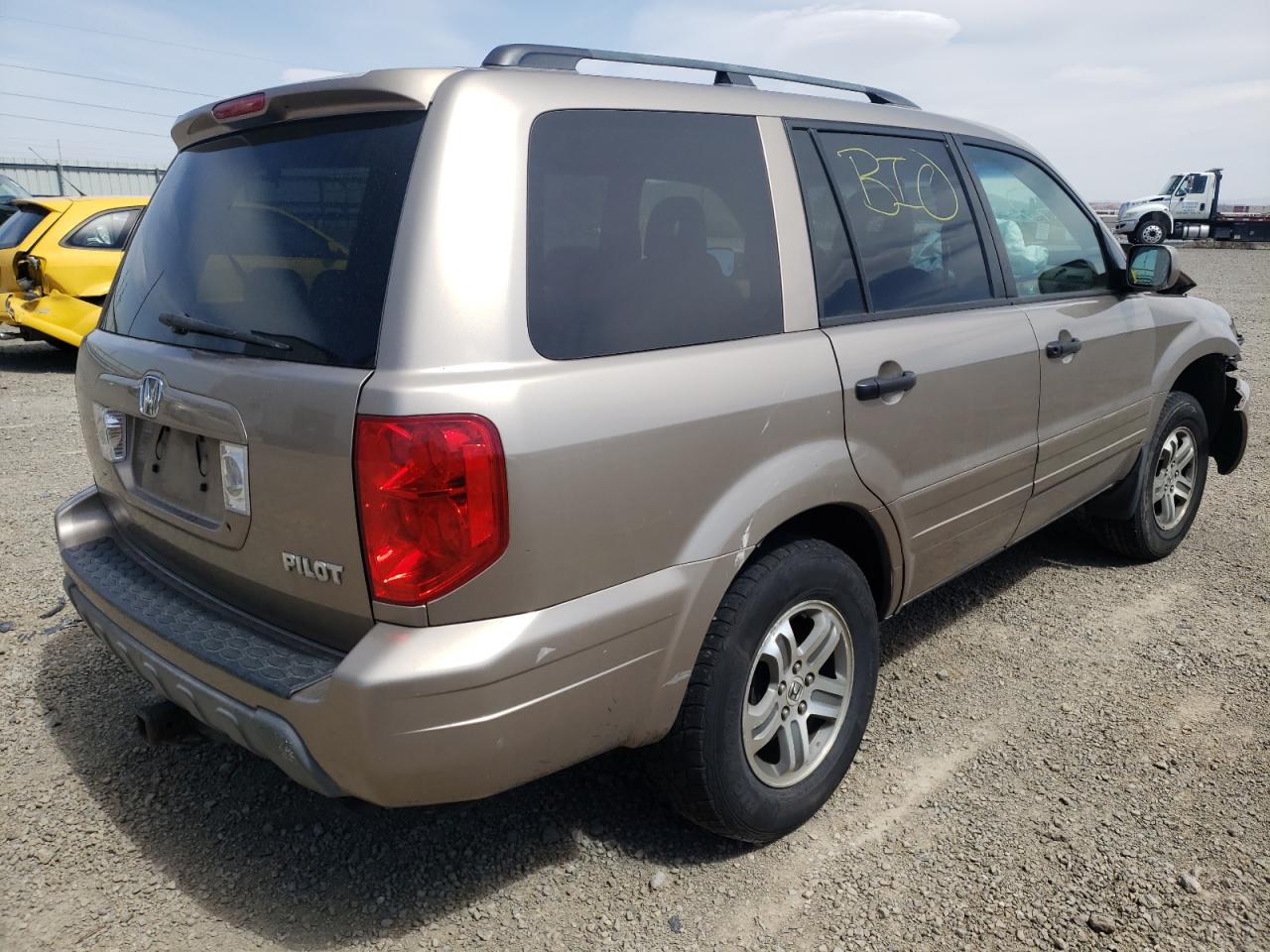 Photo 4 from auction – 2004 HONDA PILOT EXL with VIN 2HKYF18684H577593
