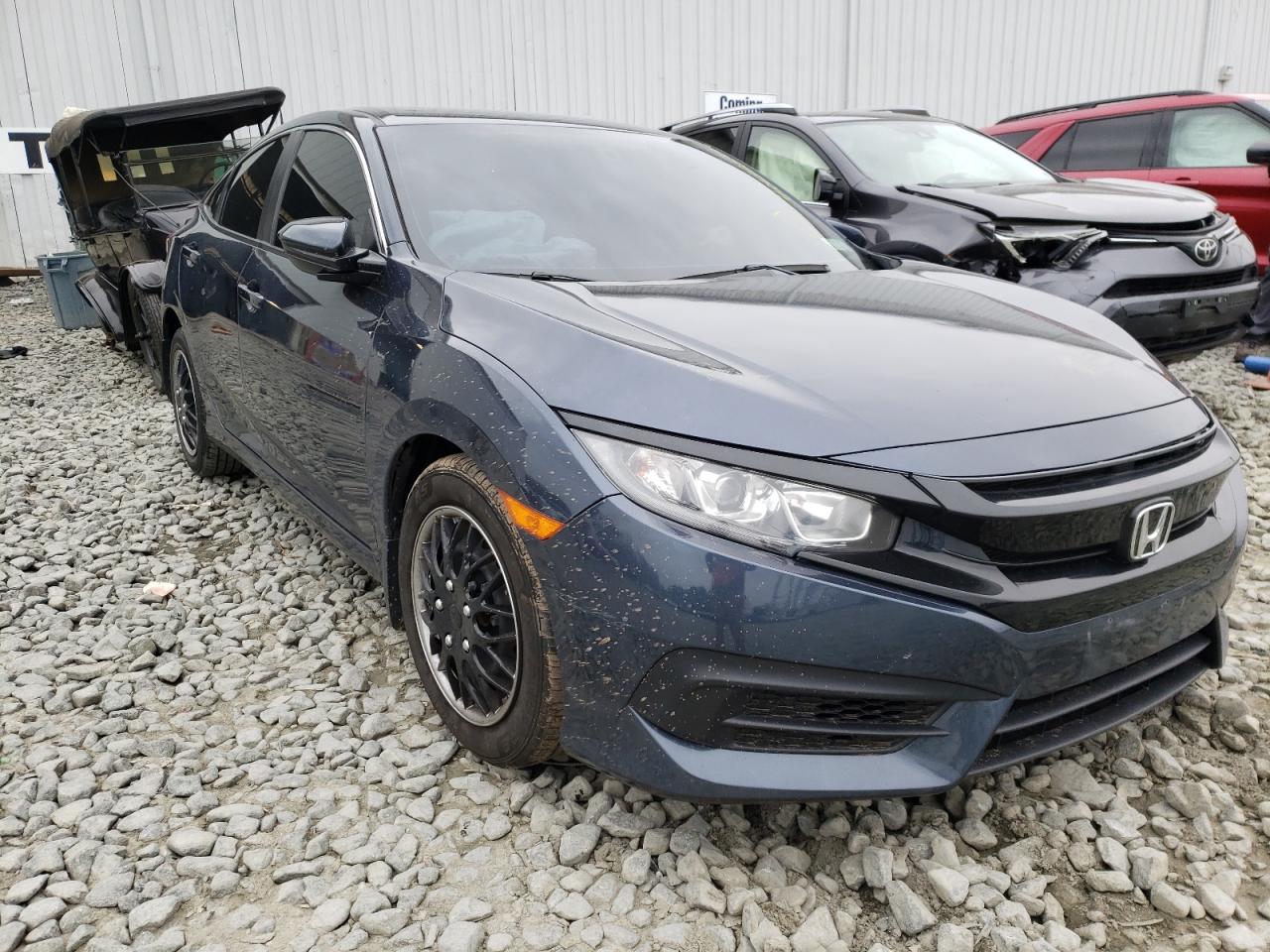 Photo 1 from auction – 2017 HONDA CIVIC LX with VIN 2HGFC2F58HH523369