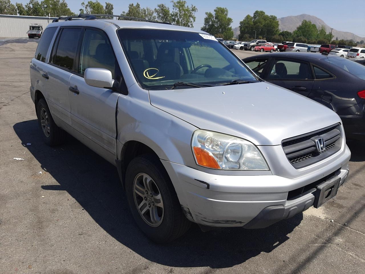 HONDA PILOT EXL 2004 with VIN 2HKYF18644H607110 - Photo from auction
