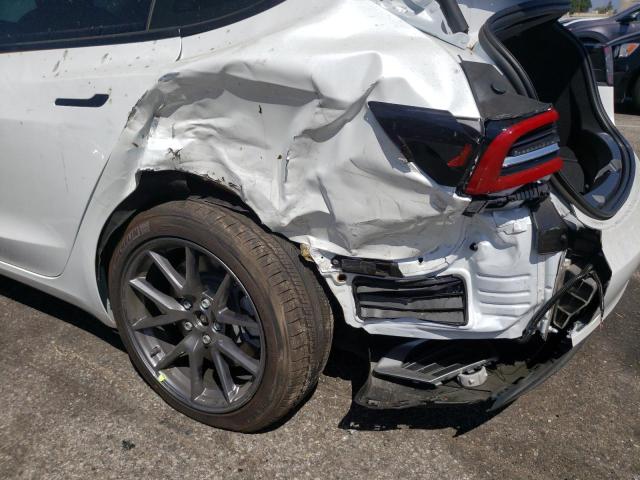 Photo 9 from auction – 2021 TESLA MODEL 3 with VIN 5YJ3E1EA9MF052689