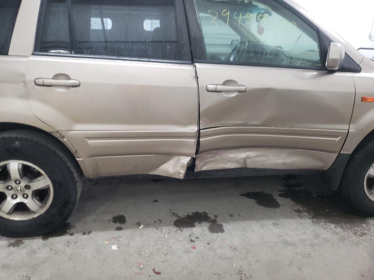 Photo 9 from auction – 2006 HONDA PILOT EX with VIN 2HKYF18546H501055